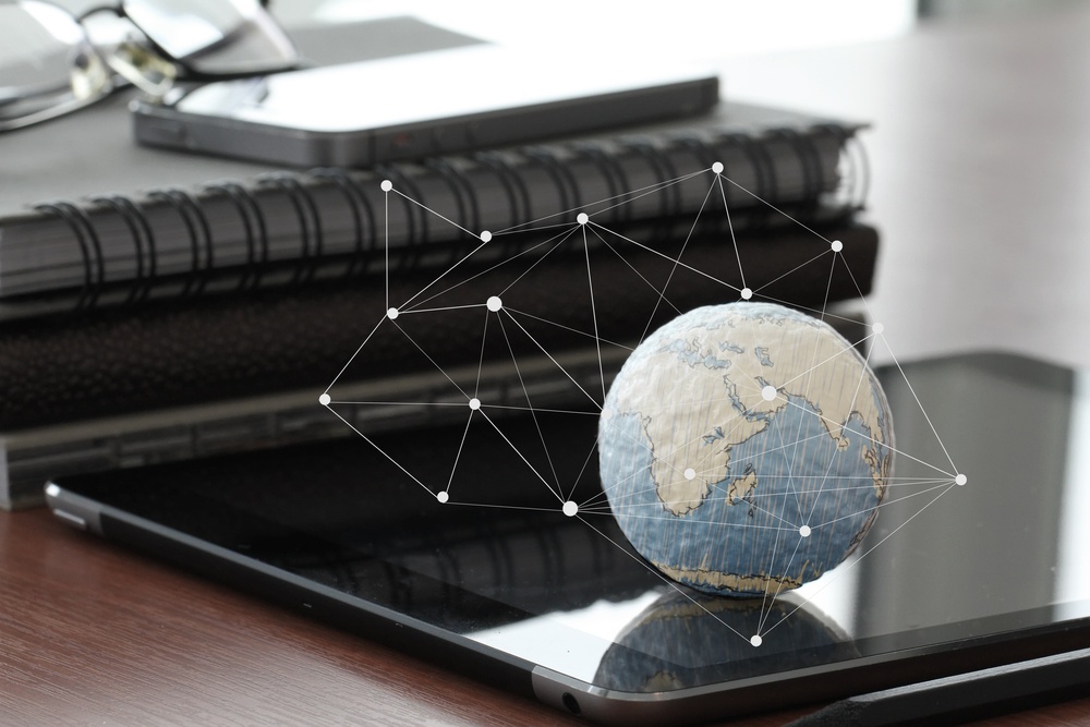 hand drawn texture globe with blank social media diagram on digital tablet computer as internet concept and bokeh exposure.jpeg