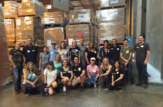 8020 Consulting volunteers at the LA Food Bank, helping to pack 4300 crates of food for seniors in the LA area