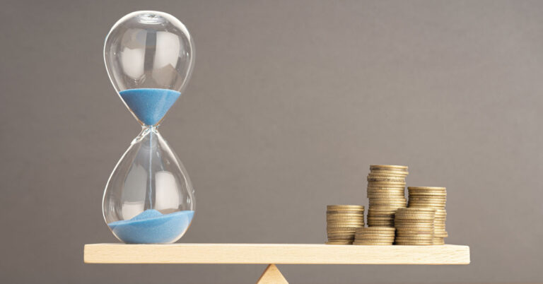 stages of effective cost savings initiatives balanced scale with coins and hourglass